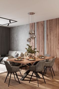 a modern dining room with wood paneled walls