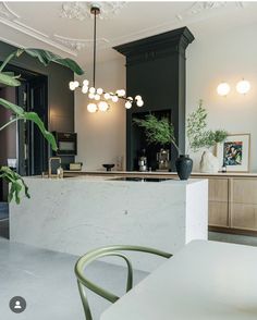 the kitchen is clean and ready to be used as a dining room or living room