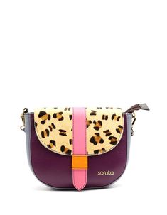 Beautiful 100% Recycled Leather Crossbody Shoulder Bag. Eco-friendly Handmade Bag in Shades of Purple and with Animal print flap. This colorful medium saddle-shaped bag is unique and will definitely make a statement when you wear it. Perfect size to fit all your everyday items. This crossbody purse has a main compartment with an inside zipper pocket. It fastens with a zipper and a leather slide closure for extra security. The purse comes with an adjustable-extending leather shoulder/cross-body s Multicolor Leather Crossbody Satchel, Multicolor Leather Saddle Bag For Daily Use, Multicolor Satchel Saddle Bag For Daily Use, Multicolor Flap Shoulder Bag With Adjustable Strap, Multicolor Crossbody Flap Bag With Adjustable Strap, Multicolor Shoulder Flap Bag With Adjustable Strap, Multicolor Rectangular Saddle Bag With Adjustable Strap, Multicolor Leather Satchel With Detachable Strap, Multicolor Crossbody Flap Bag