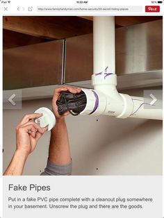 a man fixing a faucet in a kitchen with the help of an appliance