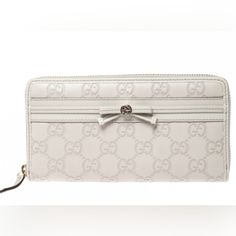 Gucci Guccisima Gg Monogram Embossed Off White Leather Zip Around Long Wallet Measurements Are 7.5"W 4"H Bags Gucci, Gg Monogram, Rebecca Minkoff Mac, Gucci Bags, Long Wallet, 4 H, White Leather, Gucci Bag, Luxury Bags