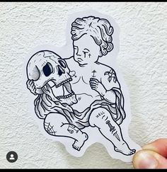 a sticker with a drawing of a skeleton holding a human skull on it's back