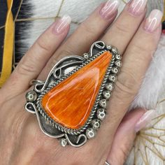 1/2 Price! NAVAJO Native American SPINY OYSTER Sterling Silver Size 9 Ring! Nice Chunk of Orange Spiny Oyster Shell! Handmade Navajo Ring! Start your Spiny Oyster collection today with this beautiful ring!  This ring is an unbelievable price...especially with the amount of Spiny Oyster on this ring!  I just LOVE the beautiful orange tones on this stone.  Pair with Navajo Pearls and your other Native American jewelry.  This ring weighs a whopping 36 grams! Please review all pictures and video bef Navajo Ring, Navajo Pearls, Navajo Rings, Orange Tones, Horse Jewelry, Native American Turquoise, Native Jewelry, Spiny Oyster, Jewelry Show