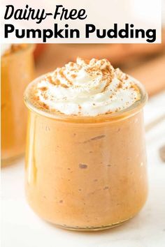 pumpkin pudding in a glass jar with whipped cream on top and the words dairy - free pumpkin pudding above it