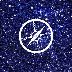 a white compass on a dark blue background with sparkling stars in the sky above it