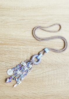 This long necklace is all hand sewn, and made with various kinds of beads. The focal point are the strands, finished with beautiful glass cabochons and a mandala charm. It will be shipped with an organza bag and shipped with a tracking number in a padded envelope. For more necklaces please check: https://www.etsy.com/shop/CinziaDesign?section_id=15986977&ref=shopsection_leftnav_4 My shop: https://www.etsy.com/shop/CinziaDesign?ref=hdr_shop_menu Bohemian Beaded Lariat Necklace, Bohemian Lariat Necklace With Beaded Chain, Bohemian Lariat Necklace With 108 Beads, Handmade Lariat Festival Necklace, Bohemian Lariat Necklace With Beaded Chain For Jewelry Making, Handmade Festival Lariat Necklace, Bohemian Long Dangle Necklace With Beads, Handmade Lariat Necklace For Festivals, Handmade Long Lariat Necklace For Festivals