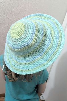 This handmade hat is the picture of versatility. Its cotton construction makes it soft, washable, light, and crushable! It can be stuffed in a backpack, thrown in the washer, rolled in the snow or mud, and will always bounce back to its original sturdy shape. Sized for children between 4 and 8 years old, this hat fits a head circumference between 19 and 23 inches. One Size Cotton Crochet Hat For Beach, Cotton Crochet Beach Hat One Size, Beach Crochet Cotton Hat One Size, Beach Crochet Cotton Hat, Cotton Hats For Everyday, One Size Fits All, Cotton Hats One Size For Everyday, Everyday Cotton Hats One Size, Green Cotton Hat One Size, Cotton Crochet Beach Hat