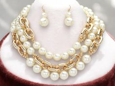 Illuminate your elegance with our Gold Plated Chunky Layer Pearl Necklace Earrings Set. Handcrafted with lustrous pearls and brilliant gold plating, this statement jewelry set is perfect for adding a touch of luxury to any outfit. Its multi-layered design ensures a unique, eye-catching look, making it an ideal gift for her special occasions. Elevate everyday wear or shine at celebrations with this timeless, sophisticated set. A perfect blend of classic charm and modern style! Made of High-Qualit Layer Pearl Necklace, Chunky Layers, Pearl Jewelry Set, Layered Pearl Necklace, Pearl Necklace Earrings, Pearl Jewelry Sets, Multi Layer Necklace, Layer Necklace, Perfect Palette