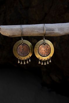 "These hand hammered and textured moon earrings are one of my all time favorites. Choose between solid sterling silver moons, solid copper moons, or raw brass moons. I can make these earrings with either a regular ear hook or 16g hand hammered hoop ring that works well for stretched ears. See video and group photos for hook comparisons, last three photos show close ups of regular hook earrings. Please choose your preferred combination from the drop down menus. A beautiful way to adorn yourself w Bohemian Hand Forged Drop Earrings, Bohemian Copper Plug Earrings Nickel Free, Bohemian Bronze Dangle Plug Earrings, Bronze Bohemian Dangle Plug Earrings, Bohemian Bronze Electroformed Hoop Earrings, Bohemian Bronze Plug Earrings, Bronze Bohemian Plug Earrings, Bohemian Bronze Round Plug Earrings, Bronze Bohemian Round Plug Earrings