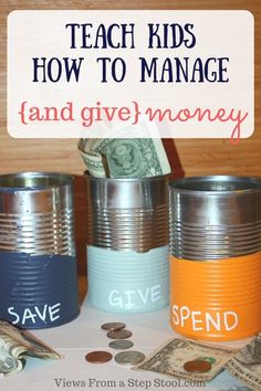 three tin canisters sitting on top of a table filled with money and the words teach kids how to manage and give money