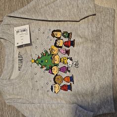 Christmas Sweater Peanuts Cute Long Sleeve Tops For Festive Occasions, Christmas Long Sleeve Tops With Cartoon Print, Fun Cartoon Print Tops For Winter, Winter Crew Neck Sweatshirt For Playtime, Playful Long Sleeve Holiday Tops, Cute Winter Holiday Tops, Playful Cotton Holiday Tops, Playful Long Sleeve Christmas Sweater, Playful Cotton Tops For The Holiday Season