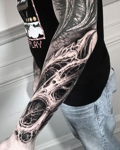 a man with a tattoo on his arm