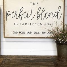 a sign that says the perfect blend established 2013 on it next to a potted plant