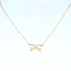 Bow Ribbon Pendant Necklace One Tone Bow Design Trendy Bow Necklace Nickel & Lead Free **Size: Approx. 16" Long + 2" Extender** Elegant 16 Inch Charm Necklaces For Gifts, Adjustable Clavicle Chain Necklace As Gift For Her, Gold Charm Necklace 16 Inch As Gift, Dainty 16 Inch Charm Necklace For Gift, Dainty Charm Necklace As Gift, 16 Inch Length, Dainty 16 Inch Charm Necklace As A Gift, Adjustable Clavicle Chain Charm Necklaces For Gift, Elegant Nickel-free Chain Necklace For Gift, Gold Chain Necklace 16 Inch As Gift