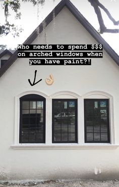 a white house with black windows and a quote on the side that says, who needs to spend $ 5's on arched windows when you have paint?