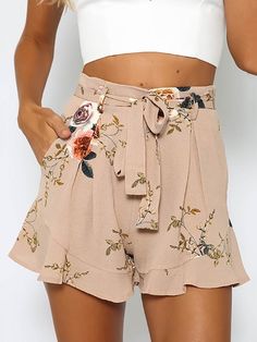 These lovely floral high waist shorts are sure to be a new fave in your wardrobe. Featuring a drawstring waist with a sash belt and ruffled hems on the legs falling mid-thigh these pair perfectly with a cropped top or bodysuit and wedges. Made with a blend of polyester and cotton. Womens High Waisted Shorts, Short Satin, Chiffon Shorts, Satin Shorts, Chiffon Fashion, Casual Summer Shorts, Ruffle Shorts, Floral Print Shorts, Floral Shorts