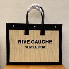 Description S.L Rive Gauche Tote Bag In Raffia For Women 18.9in/48cm YSL Rep 1:1 Size: 48 x 36 x 16cm / 18.9 x 14.2 x 6.3 inches (Length x Height x Width ) Snap button Handle: double Big compartment Magnetic snap closure Include dust bag. This product is of the best quality. Saint Laurent Rive Gauche Tote, Ysl Bags, Rive Gauche, Chanel Deauville Tote Bag, Evening Clutch Bag, Vuitton Bag, Tote Backpack, Snap Button, Ysl Bag