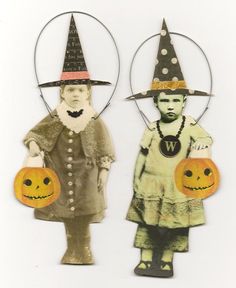 two children wearing halloween costumes with pumpkins on their heads and one holding a jack - o'- lantern