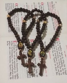 Wooden Christian 33 knot Prayer Rope / Car Pendant / Prayer Beads / komboloi 33 Wooden small Beads 1 Wooden Icon big Bead: Jesus Christ as Vine / Jesus Christ / crucifixion / Panagia Glykofilousa / Panagia Amolyntos/ St George / St Dimitrios / St Nikolas / St Ekaterina / St Cristofer Wooden Cross Jesus Christ crucifixion 2 Metalic Golden Beads 2 Metalic Golden Cross bead Elastic Cord For bless ,protection and prayer Blessed on the lerics of Saints and Holy cross With myrrh/ anointing oil Prayer Anointing Oil Prayer, Beaded Brown Rosary Gift, Christ Crucifixion, Orthodox Prayer Rope, Brown Beaded Rosary Gift, Brown Wooden Beaded Cross Rosary, Brown Beaded Spiritual Rosary, Golden Cross, Biblical Artwork