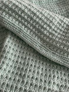 a close up view of a knitted sweater