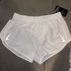 Nwt Nike White Running Shorts White Athletic Shorts For Workout In Spring, White Athletic Shorts For Spring Workout, White Workout Bottoms For Summer, White Nike Bottoms For Beach, White Nike Athletic Shorts For Summer, White Athletic Shorts With Pockets For Spring, Nike White Short Leg Bottoms, White Workout Shorts With Pockets, White Nike Shorts With Pockets