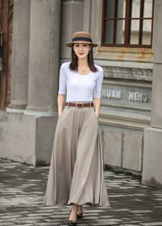 "Get dressed and out of the door in classic good looks with this pleated Long maxi skirt, crafted with soft cotton linen fabric, featuring pleated waist detail and two big pockets. DETAIL * More color https://etsy.me/3fsncV4 * 50% linen, 50% cotton * Has no lining, Not see through * Two pockets * High waistband * Back elastic waistband * Right Side zipper closure * Ankle length * Perfect for spring and summer, autumn * Wash by hand or machine with cold water *The model is 170 cm (5′7″) tall with Long Aline Skirt Outfits, Khaki Long Skirt Outfit, Beige Maxi Skirt Outfit, Natasha Aesthetic, Long Beige Skirt, Beige Long Skirt, Beige Skirt Outfit, High Waist Maxi Skirt, Nude Skirt