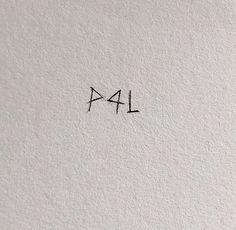 the number four is written in black ink on a white paper sheet with writing underneath it