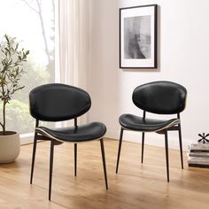 Set of 2 Dining Side Chairs. Features a softly curved back and the backside in walnut veneer. Faux leather upholstered. Art Leon Set of 2 Contemporary/Modern Faux Leather Upholstered Dining Side Chair (Composite Frame) in Black | CC067-2-BK Modern Wood Dining Chair, Chic Accent Chairs, Retro Contemporary, Lobby Seating, Ergonomics Furniture, Midcentury Modern Dining Chairs, Faux Leather Dining Chairs, Mid Century Modern Dining, Dining Chairs Set