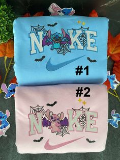 Introducing our Stitch and Angel Halloween Nike Embroidered Sweatshirts, the perfect blend of comfort and style for this spooky season! Made with premium quality materials, these sweatshirts feature intricate embroidery detailing of the beloved Disney characters Stitch and Angel, adding a touch of magic to your wardrobe. Designed with a relaxed fit and soft, cozy [...] Stitch And Angel Halloween, Spooky Stitch, Disney Characters Stitch, Angel Halloween, Embroidery Crewneck, Matching Outfits Best Friend, Christmas Gifts For Couples, Disney Sleeping Beauty, Stitch And Angel