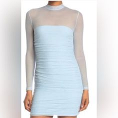 Step Out With Confidence In This Mock Neck Bodycon Dress Featuring A Sheer Yoke And Sleeves. Size Large Chest Armpit To Armpit 16” Length 35” Mock Neck Long Sleeves Back Zip Closure Partial Sheer Construction Ruched Details 95% Nylon, 5% Spandex With 100% Polyester Lining Nwot- No Flaws This Is A Baby Blue The Lighting & White Back Ground Can Sometimes Effect The Vibrancy Of The Images . But A Very Pretty Pastel Baby Blue . Blue Sheer Mini Dress For Spring, Sheer Blue Mini Dress For Spring, Blue Sheer Mini Dress, Light Blue Long Sleeve Ruched Mini Dress, Mock Neck Bodycon Dress, Mock Neck Long Sleeve, Neck Bodycon Dress, Sleeve Bodycon Dress, Design Dresses