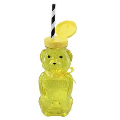 a yellow bear shaped glass bottle with a black and white striped straw