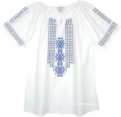 Womens White Embroidered Resort Tunic in Alabaster with Blue Embroidery. Our beautiful bright-white tunic top draws inspiration from Aztec and Inca influences. A round split neckline with self-tie closure. A piece of modest resort wear. It features delicate embroidery with a vintage touch. A flowing silhouette and comfortable cotton This tunic is a great choice for women who want current, flattering, fashion that complements a go-to lifestyle. It features short sleeves, a straight hem tunic with Traditional White Embroidered Top For Vacation, White Peasant Tops With Geometric Embroidery, White Peasant Embroidered Top With Embroidered Border, White Bohemian Blouse With Machine Embroidery, White Peasant Top With Embroidered Border, Traditional White Peasant Top With Embroidered Neckline, White Peasant Top With Embroidered Neckline, White Short Sleeve Tops With Embroidered Border, Casual White Peasant Top With Embroidered Neckline