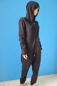 "This fleece overal full bodysuit opens with a double zipper and is perfect for netflix and chill ,full length sleeves and legs as well as hood and pockets will make winter feels much pleasant. Think about how much heat cost it will save you and cold pills too.Definite a musthave. Define size ,fits to body with the following circumferences XS smaller than: S Waist-----------------------------Hip--------------------------Bust 26\"-28\"(66cm-71cm)--------35''-37\"(89cm-94cm)-----34''-36''(86cm-90c Casual Winter Bodysuit With Thumbholes, Hooded Onesie For Fall Loungewear, Winter Cotton Bodysuit For Loungewear, Cotton Bodysuit For Winter Loungewear, Winter Solid Jumpsuits And Rompers For Loungewear, Winter Cotton Jumpsuits And Rompers For Loungewear, Long Sleeve Jumpsuits And Rompers With Thumbholes For Loungewear, Full Length Bodysuit With Thumbholes For Winter, Winter Long Sleeve Stretch Jumpsuits And Rompers