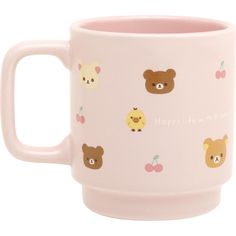 a pink coffee mug with bears and cherries on it