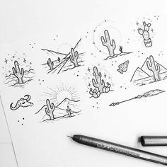 a drawing of cactuses and mountains in the desert with pencils next to it