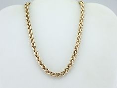 A simple chain, worn without pendant or distraction, is the ultimate luxury statement piece! We love the bold profile of this necklace, and the elegant sheen of the polished gold. Sophisticated and refined, this will transition from casual daytime wear to the finest of evening gowns with ease! Metal: 14K Yellow Gold Width of Chain: 7 mm Length of Chain: 16 Inches Marks: "14KT" Stamped on the clasp Luxury Everyday Wheat Chain Necklace, Luxury Modern Jewelry With Wheat Chain, Luxury Chain Necklace For Evening, Luxury Gold Plated Wheat Chain Necklaces, Luxury Gold Plated Wheat Chain Jewelry, Luxury Metal Jewelry With Wheat Chain, Modern Luxury Jewelry With Wheat Chain, Luxury Metal Wheat Chain Necklace, Luxury Metal Necklace With Wheat Chain