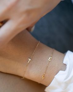 Personalized 14k solid gold mini diamond letter bracelet! Simple, minimalist everyday bracelet - Perfect dainty everyday bracelet with a sparkle.Personalize this bracelet with your choice of uppercase alphabet Initial. Great as a gift for special someone or for yourself. Each initial measures approx.5mm, You can add up to 5 Initials Available in 14K Yellow Gold or 14K White Gold * Leave us your initials and placement in the comment box at checkout. Delicate Personalized Name Bracelet, Minimalist Everyday Name Bracelet, Dainty 14k Gold Name Bracelet, Dainty Name Bracelet, Minimalist 14k Gold Bracelet For Personalized Gift, Minimalist 14k Gold Bracelet As Gift For Her, Minimalist 14k Gold Bracelet - Gift For Her, Minimalist Yellow Gold Bracelets With Initials, Minimalist Bracelets For Personalized Gift