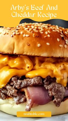 a cheeseburger on a bun with the words arby's beef and cheddar recipe