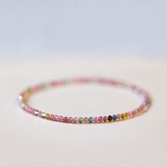 Natural 3mm Tourmaline Stone Dainty Bracelet Rainbow Gemstone Bracelet Handmade Material: 3mm Tourmaline Stone Size: Fits About 6 ~ 7.5 Inch Wrist Minimalist Pink Round Bracelet, Dainty Pink Beaded Bracelets With Gemstone Beads, Dainty Pink Round Bracelet, Delicate Pink Round Bracelets, Dainty Pink Bracelets With Gemstone Beads, Dainty Pink Gemstone Bead Bracelets, Dainty Pink Bracelet With Natural Stones, Dainty Pink Gemstone Beads Bracelet, Elegant Pink Tourmaline Bracelets