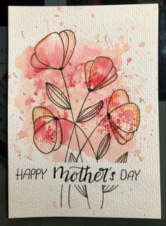 a card with watercolor flowers and the words happy mother's day on it