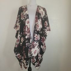 This Beautiful Dillard's Cardigan Boasts A Stunning Black And Pink Floral Pattern With 3/4 Sleeves And An Open Front. The Oversized, Collarless Design Is Perfect For Layering Over Any Casual Outfit, And The Lightweight, Breathable Fabric Makes It Suitable For All Seasons. The Tight-Knit, 100% Acrylic Material Is Soft And Comfortable To Wear, While The Straight Hem And Lace Short Sleeves Add A Touch Of Elegance. Hand Wash Only To Keep This Gorgeous Cardigan Looking Its Best. Shoulder To Shoulder Casual Black Cardigan With Floral Print, One Size Black Outerwear For Spring, Black Short Sleeve Cardigan For Spring, Black Spring Cardigan For A Day Out, Black Cardigan For Spring Day Out, Oversized Short Sleeve Cardigan For Spring, Black Summer Outerwear For Daywear, Dillards Women, Multicolor Knit