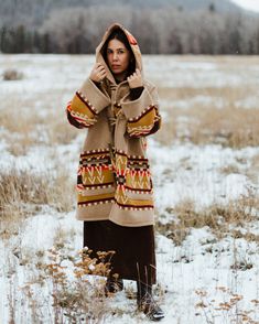 In this pattern, geometric pinnacles pay tribute to Beacon Rock, a dramatic formation in the Columbia River Gorge. Geometric hills and cliffs border a center band that represents the mighty Columbia on its path to the Pacific Ocean. Fully lined hooded cloak with a straight fit, raglan sleeves, welt patch pockets and four horn toggle closures. Fabric: Pendleton blankets: 82% Wool, 18% Cotton. Wool Cashmere facings and Silk Rayon peachskin lining. Cloak With Hood, Pendleton Blankets, Winter Cloak, Pendleton Blanket, Columbia River Gorge, The Pacific Ocean, Hooded Cloak, Pendleton Wool, Wool Winter