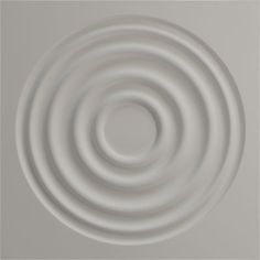 a white circular object is shown in the middle of a gray background with an abstract design