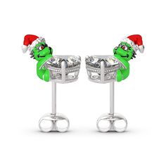 Do you still remember a green monster in that Christmas fantasy comedy film? Inspired by this film, the design of these earrings in Hug Me® collection shows a vivid monster with red Christmas hat, green face, bright eyes and radiant smile. Crafted in sterling silver and finished with colourful design, each earring features this lovely monster that hugged the center stone. You will instantly fall in love with this cute design. You will find more adorable and creative designs in our Hug Me® collec Valentine's Day Sterling Silver Diamond Earrings, Monster Heart Necklace, Heart-shaped Sterling Silver Huggie Earrings For Valentine's Day, Valentine's Day Heart-shaped Silver Diamond Earrings, Sterling Silver Heart-shaped Diamond Earrings For Valentine's Day, Christmas Hearts, Green Monsters, Comedy Films, Bright Eyes