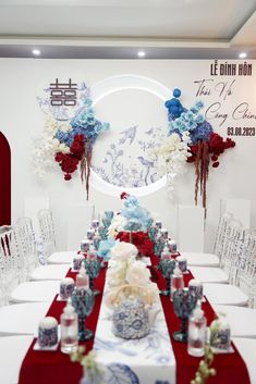 the table is set with red, white and blue flowers