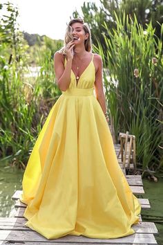 Yellow Sleeveless Gown For Prom Season, Yellow Ball Gown For Evening, Yellow Ball Gown For Party, Yellow Ball Gown For Prom Season, Elegant Yellow Maxi Dress For Prom Season, Fitted Yellow Bridesmaid Evening Dress, Fitted Yellow Evening Dress For Bridesmaid, Yellow Satin Party Gown, Yellow Satin Gown For Party