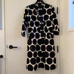 Fully Lined Cotton Midi Dress. Lined. Appropriate For Fall Or Winter. Button Front. Comes With Belt. New. Similar To Marimekko Dots Circles Kivet Pattern. Side Flap Pockets. Ptp 17” Waist 16” Hips 20.5” Length 41” Elegant Polka Dot Dresses With Buttons, Cotton Coat, Cotton Midi Dress, Black White, Size 6 Dress, Winter Dresses, Coat Dress, Colorful Dresses, Dots