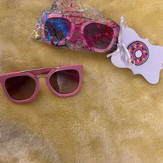 Pink Kids Sunglasses- Let Your Little Girl Get Her Barbie On With These Cute Sunglasses! Comes With Bag! Fun Pink Sunglasses For Gift, Playful Pink Polarized Sunglasses, Pink Tinted Sunglasses As Gift, Cute Pink Polarized Sunglasses, Playful Plastic Sunglasses For Gifts, Cute Pink Sunglasses With Mirrored Lenses, Playful Plastic Sunglasses For Gift, Playful Plastic Sunglasses As Gift, Pink Fun Sunglasses With Glass Lenses