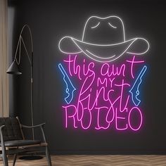 a neon sign that says, this is my first photo