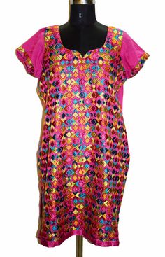 "Item Description : multi color cotton hand embroidered bagh phulkari top. Floral design with green/orange/red/black/white thread work. Top with remarkable embroidery brighten the look of wearer and adds up charm to their outfits. Awesome work. This designer top with floral design will make you look smart & elegant. Team it with leggings for comfort & style. Pakistan Bagh Phulkari : Over time, special phulkari patterns known as Bagh emerged in Punjab. In typical phulkari, embroidery is u Festive Multicolor Kurta With Resham Embroidery, Multicolor Straight Kurta With Resham Embroidery, Multicolor Kurta With Mirror Work For Navratri, Multicolor Mirror Work Kurta For Navratri, Navratri Multicolor Chanderi Kurta, Festive Multicolor Kurta With Mirror Work, Multicolor Straight Kurta With Mirror Work, Multicolor Bollywood Chanderi Kurta, Multicolor Bollywood Style Chanderi Kurta